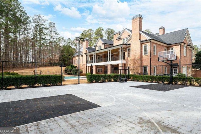 3201 Hobsons Ridge Trl NW, Acworth, GA 30101 - view of basketball court with community basketball court and a swimming pool