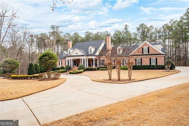3201 Hobsons Ridge Trl NW, Acworth, GA 30101 - view of front of house with a chimney and curved driveway