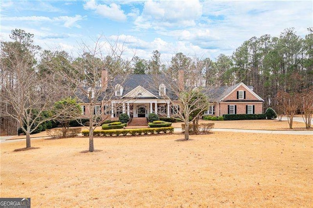 view of front of property with a front lawn