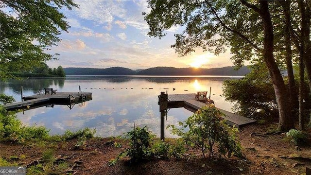 dock area featuring a water view