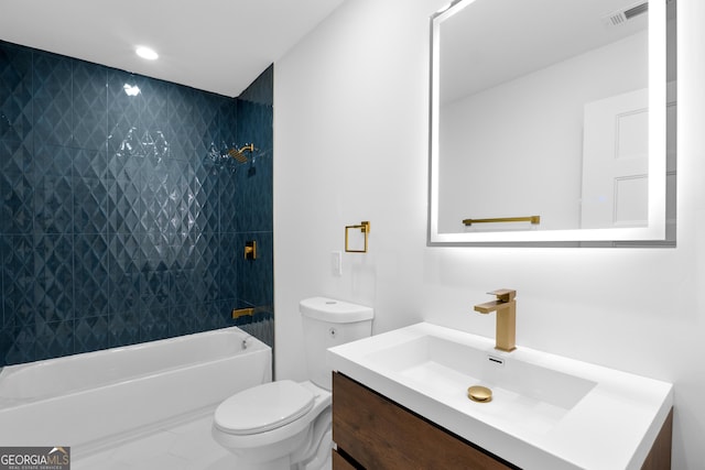 bathroom featuring  shower combination, visible vents, vanity, and toilet