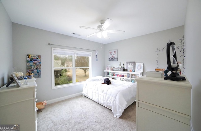 bedroom with ceiling fan and carpet floors