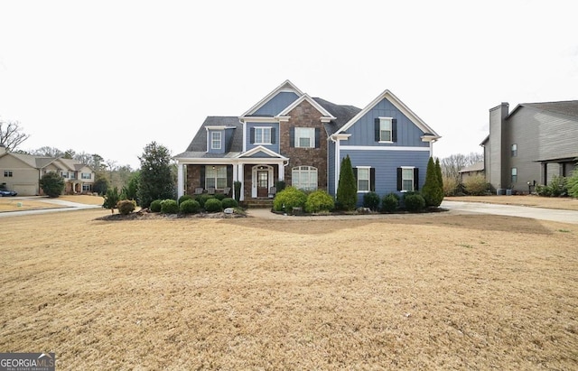 view of front facade featuring a front yard