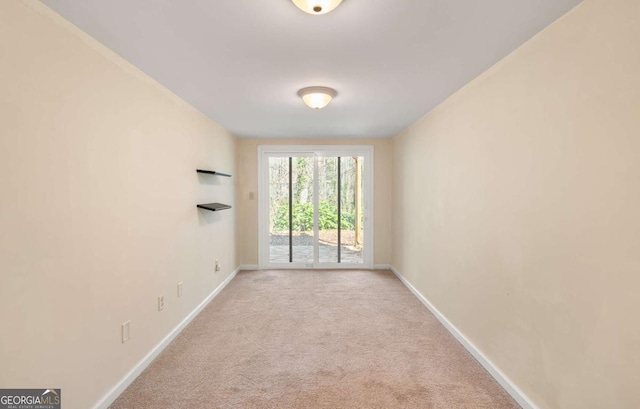 view of carpeted spare room