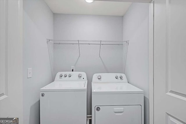 laundry area with washer and dryer