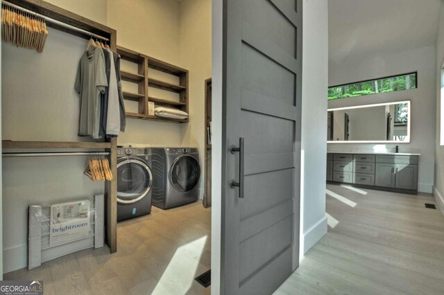 415 Green Ridge Trl, Blue Ridge, GA 30513 - laundry area featuring washing machine and clothes dryer and light wood-type flooring