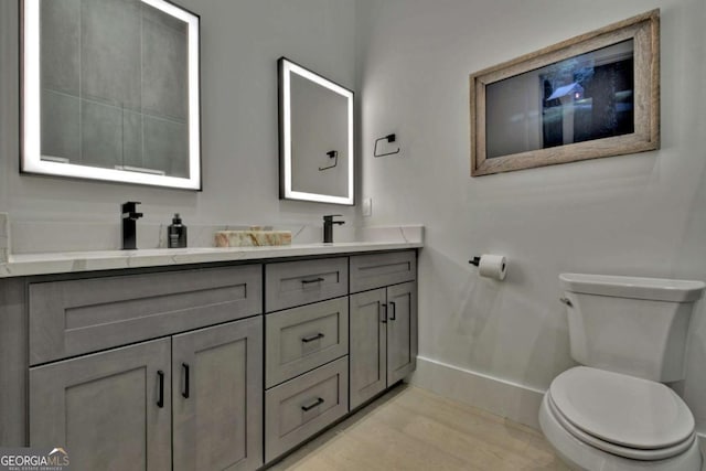 415 Green Ridge Trl, Blue Ridge, GA 30513 - bathroom with toilet, vanity, and wood-type flooring