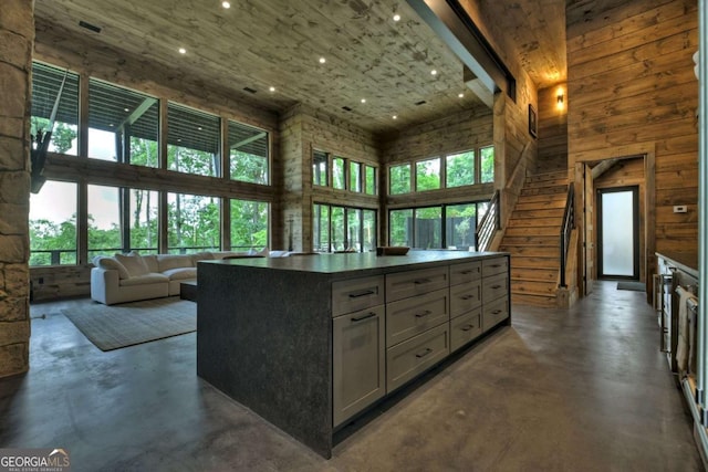 415 Green Ridge Trl, Blue Ridge, GA 30513 - kitchen with a center island, gray cabinetry, and a high ceiling