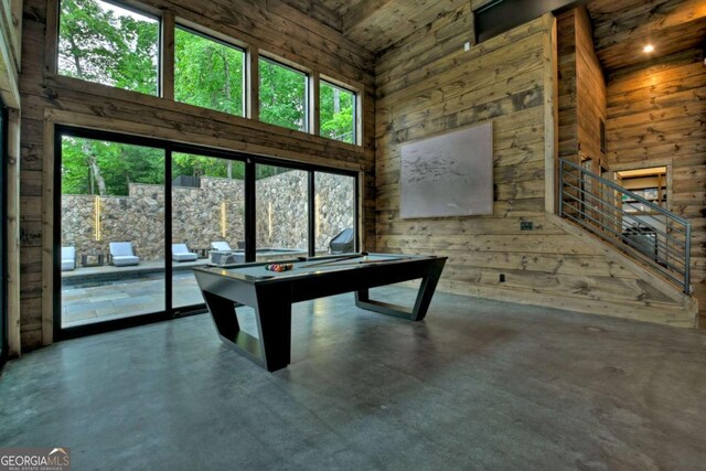 415 Green Ridge Trl, Blue Ridge, GA 30513 - rec room featuring a high ceiling, pool table, concrete flooring, and wooden walls