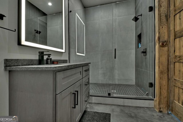 415 Green Ridge Trl, Blue Ridge, GA 30513 - bathroom with concrete flooring, vanity, and a shower with door