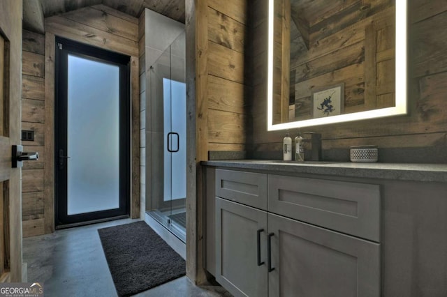 415 Green Ridge Trl, Blue Ridge, GA 30513 - bathroom featuring concrete flooring, wooden walls, vanity, and walk in shower