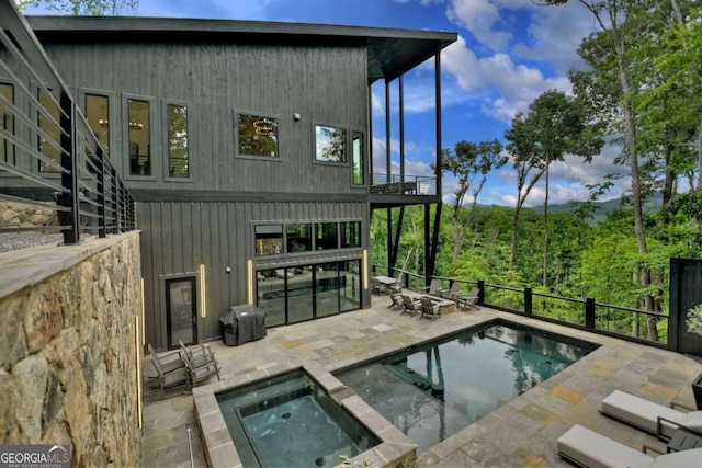415 Green Ridge Trl, Blue Ridge, GA 30513 - view of swimming pool with an in ground hot tub and a patio area