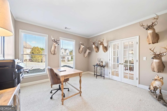 office area with light colored carpet, french doors, and ornamental molding