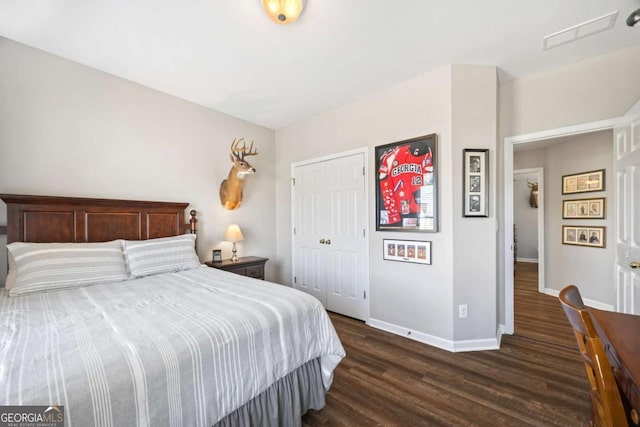 bedroom featuring dark wood-type flooring