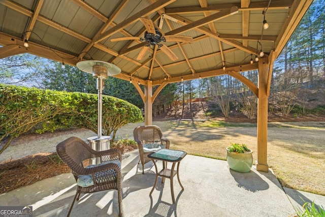 view of patio with a gazebo and ceiling fan