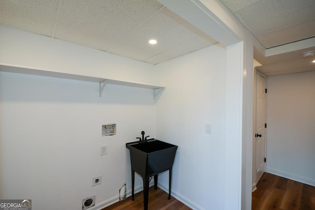 clothes washing area featuring washer hookup, laundry area, electric dryer hookup, and dark wood-style flooring