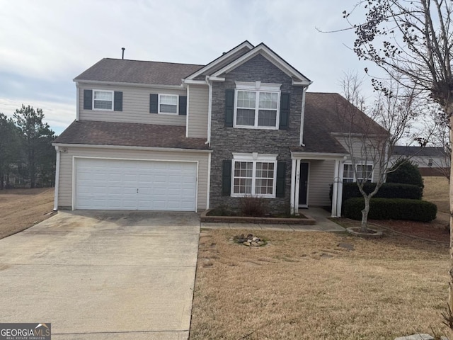 view of front of house with a front lawn and a garage