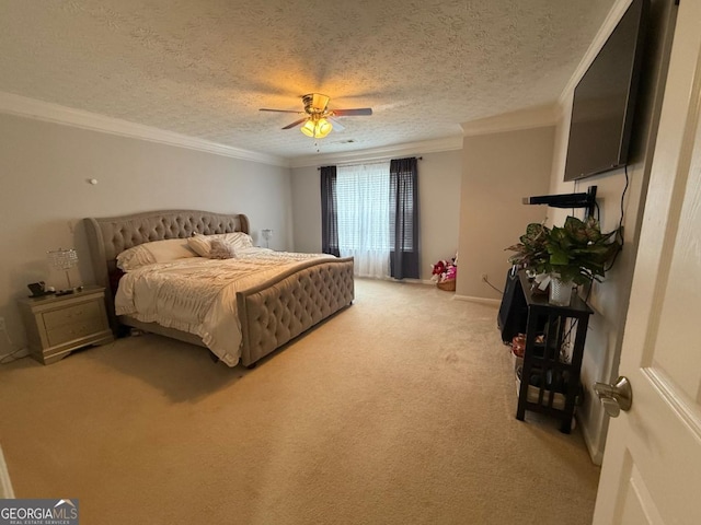 carpeted bedroom with a textured ceiling, ceiling fan, and ornamental molding