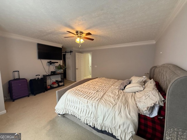 bedroom featuring a textured ceiling, ornamental molding, carpet flooring, and ceiling fan