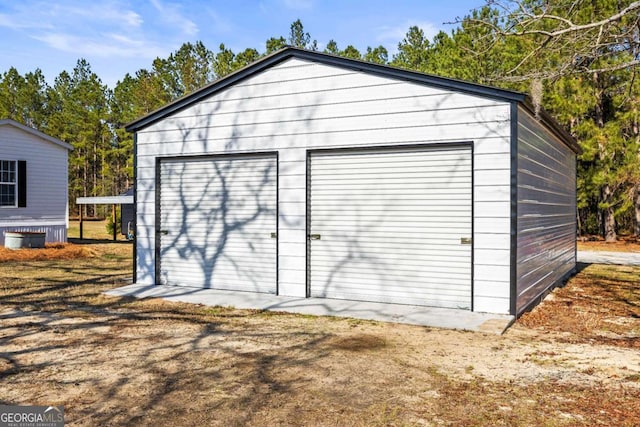 view of outdoor structure with a garage