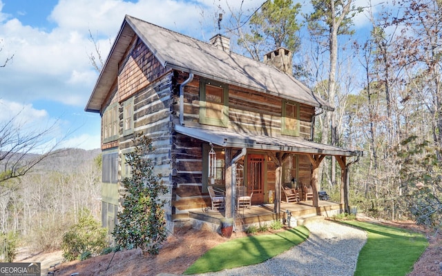 view of front of home featuring covered porch