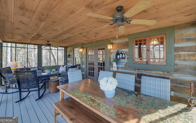 sunroom with ceiling fan, french doors, a healthy amount of sunlight, and wood ceiling