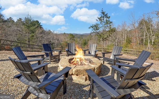 view of patio featuring an outdoor fire pit