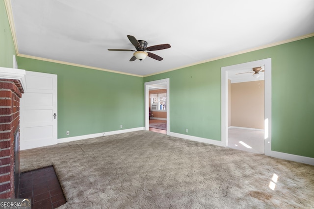 interior space featuring ornamental molding, carpet, and baseboards