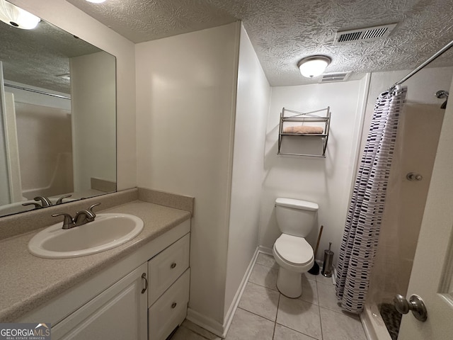 bathroom with visible vents, a shower with shower curtain, toilet, a textured ceiling, and vanity