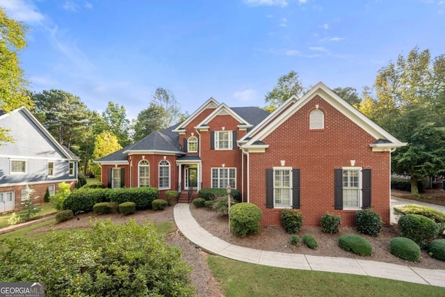 view of front of house featuring brick siding