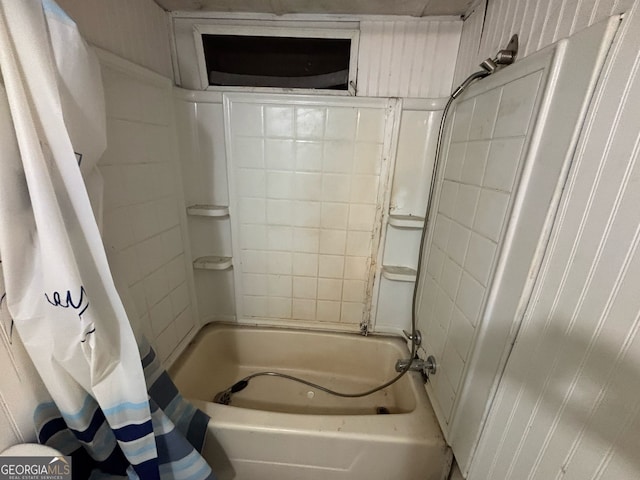 bathroom with shower / bathtub combination with curtain