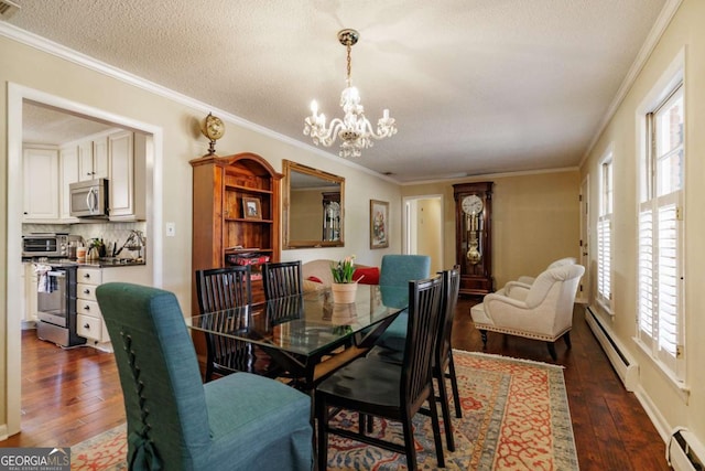 dining room with ornamental molding, dark hardwood / wood-style floors, and a baseboard radiator