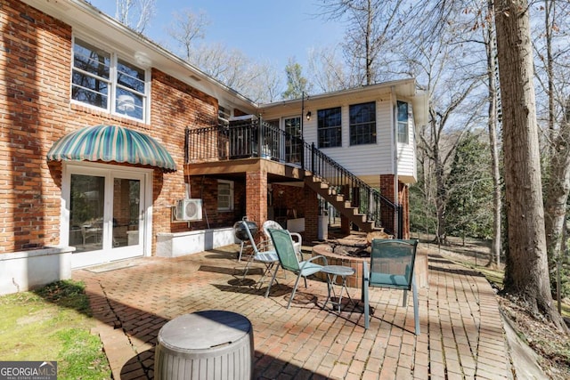 back of house featuring a patio and french doors