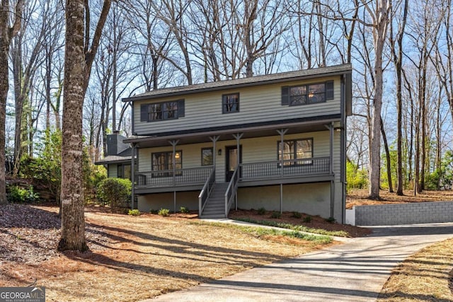 view of property with covered porch