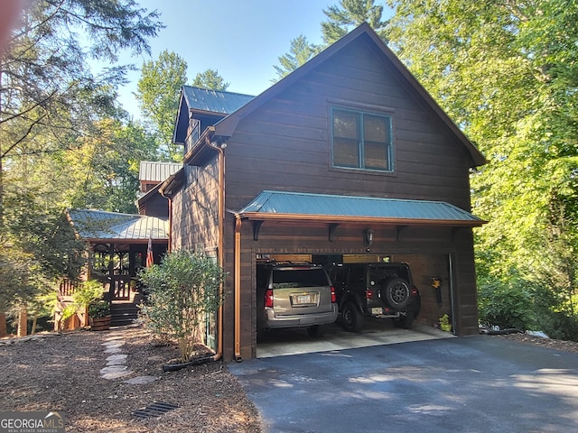 20 Walker Ridge Way Unit 36, 42, Mineral Bluff, GA 30559 - view of side of home with metal roof