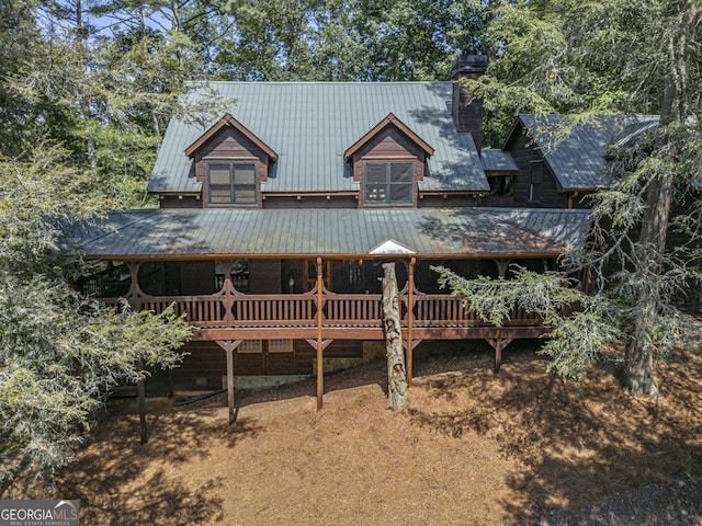 20 Walker Ridge Way Unit 36, 42, Mineral Bluff, GA 30559 - back of property featuring a deck, a chimney, metal roof, and a standing seam roof