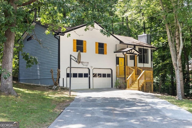 view of front of home with a garage