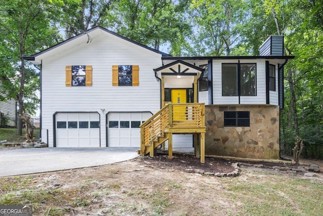 split foyer home featuring a garage