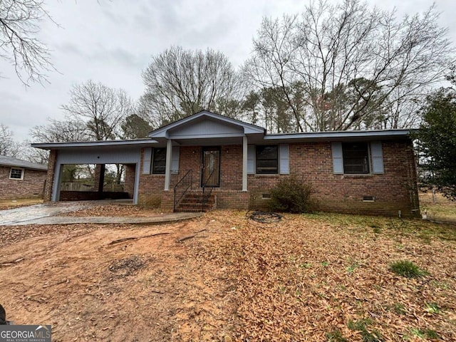 view of front of property featuring a carport