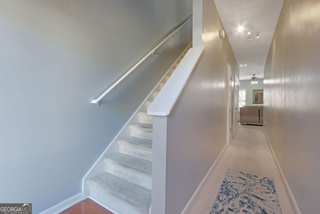 stairway with baseboards