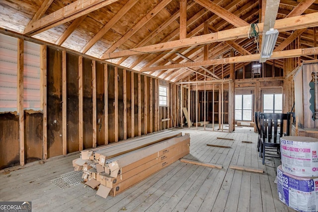 misc room with plenty of natural light and lofted ceiling