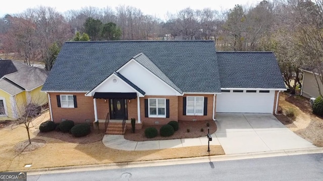 view of front of property with a garage