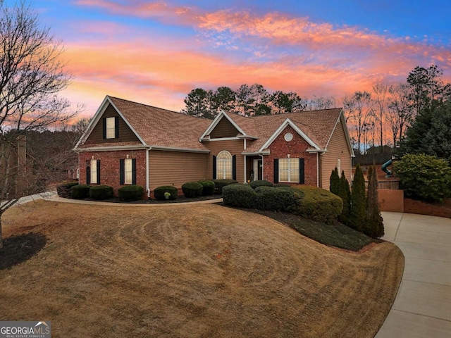 view of front of home with a lawn