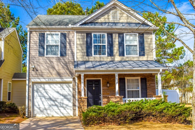 view of front of house featuring metal roof, a porch, and a standing seam roof