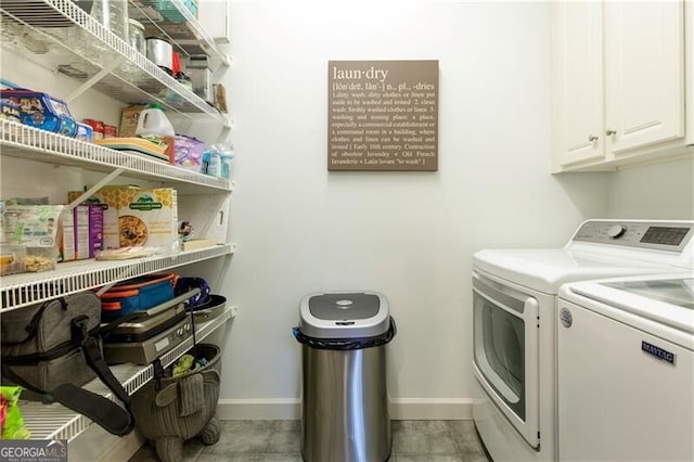 laundry area with cabinets and independent washer and dryer