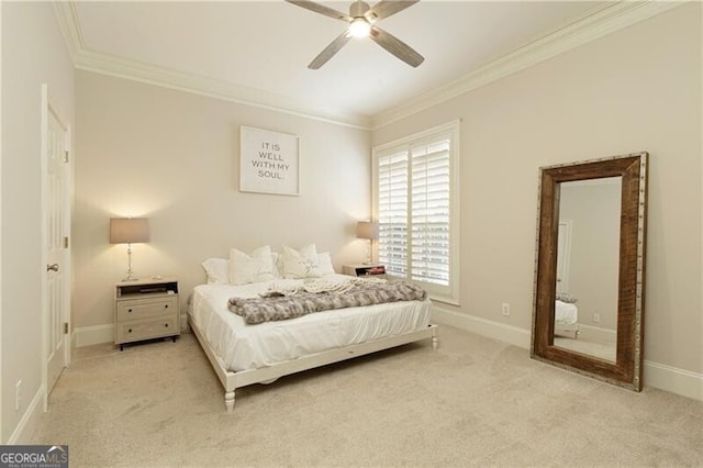 carpeted bedroom with crown molding and ceiling fan