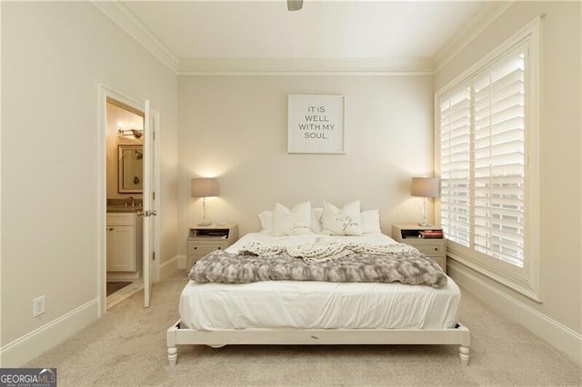 bedroom featuring sink, light carpet, crown molding, and connected bathroom