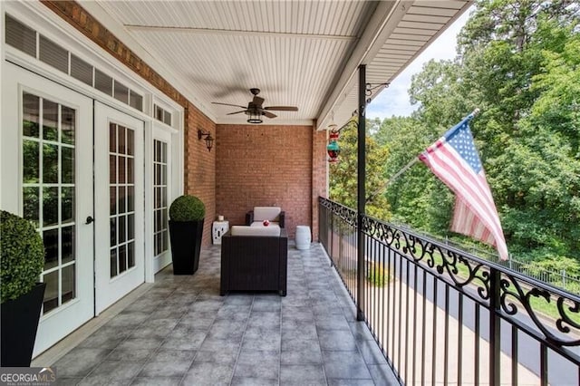 balcony featuring french doors and ceiling fan