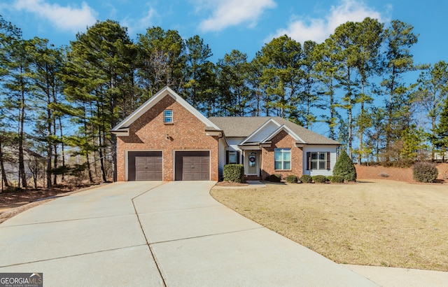 view of front facade with a garage and a front yard