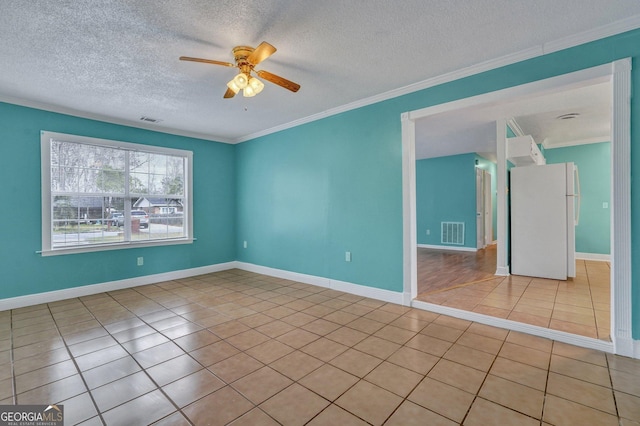 107 Overland Trl, Savannah, GA 31419 - empty room featuring ceiling fan, a textured ceiling, light tile patterned floors, and ornamental molding